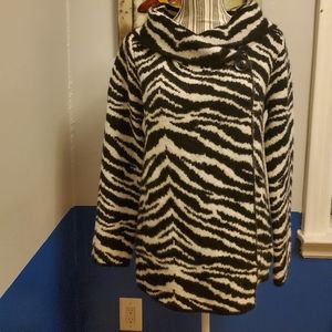 Stylist sweater/heavy enough to wear as a light jacket